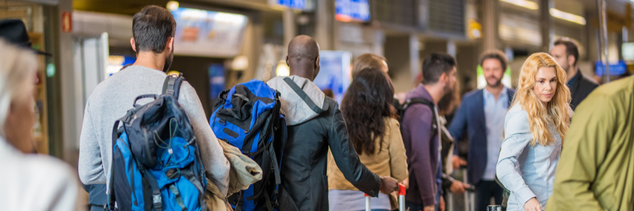 People queueing at the airport to travel to the United States